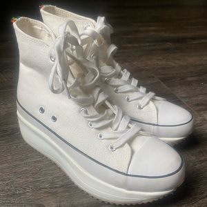 High top tennis shoes… like NEW